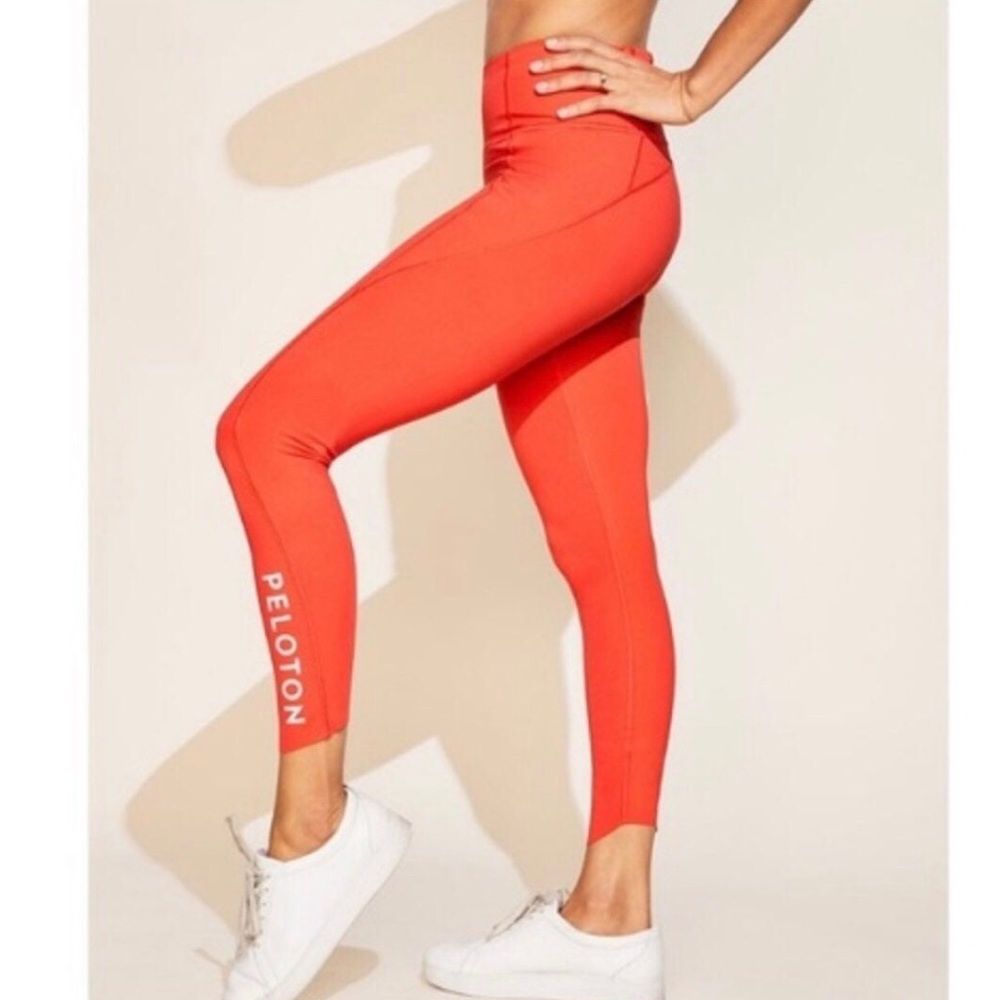 Orange athleta super zonic 7/8 peloton pants